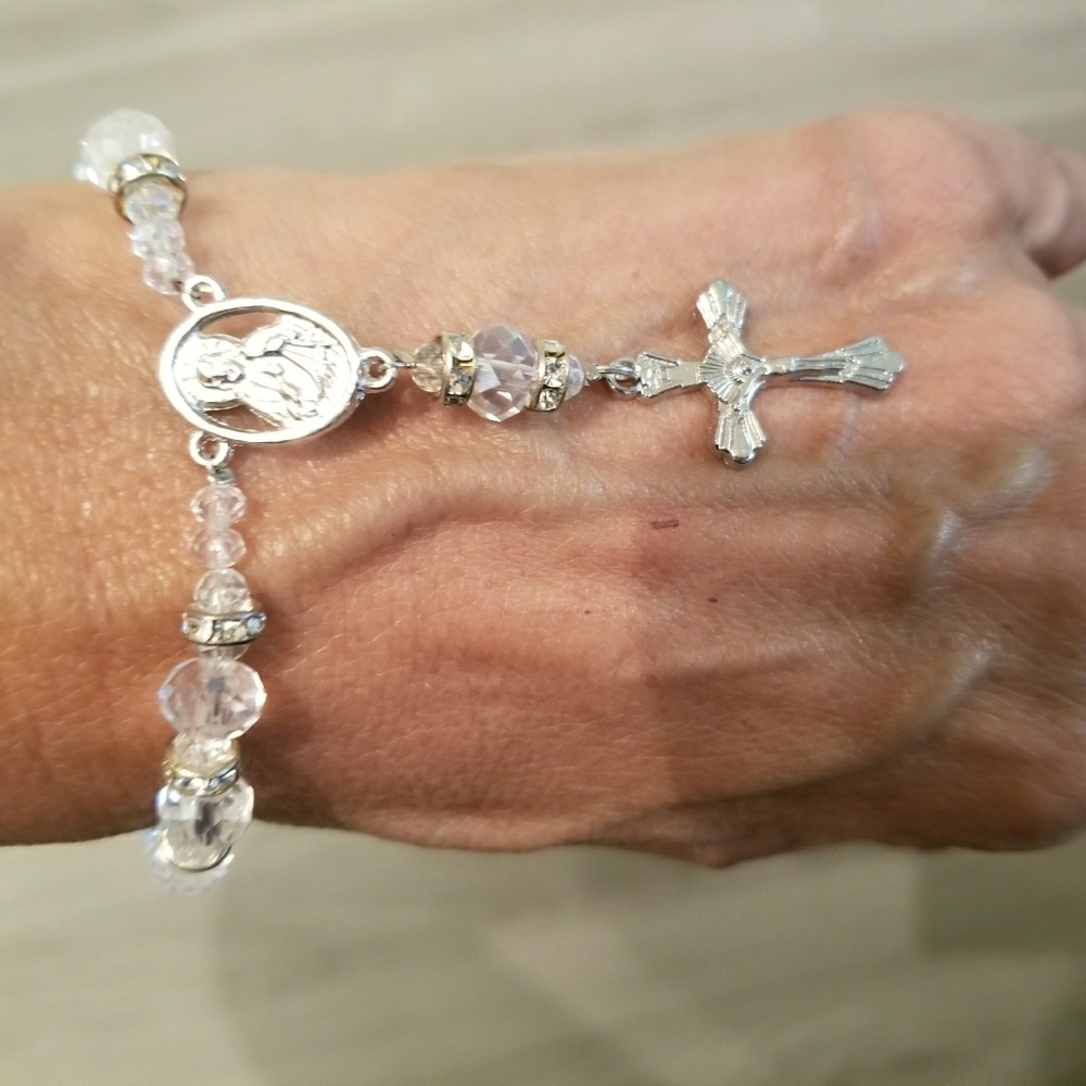 Holy cross beaded bracelets, silver color